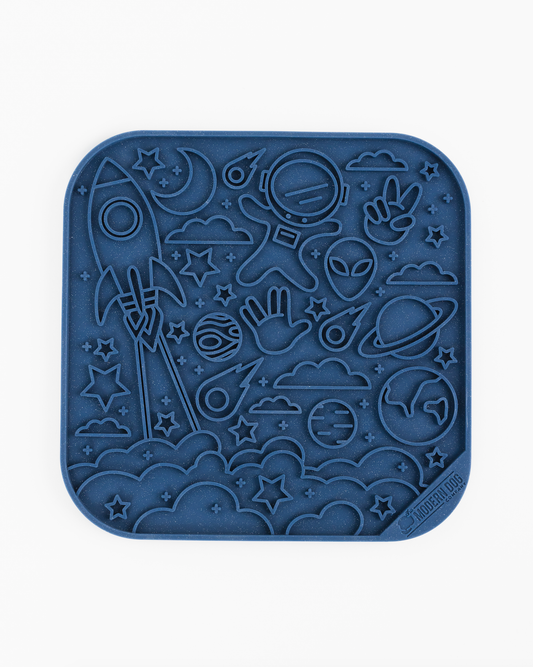 Alfombrilla para lamer con diseño de espacio de otro mundo