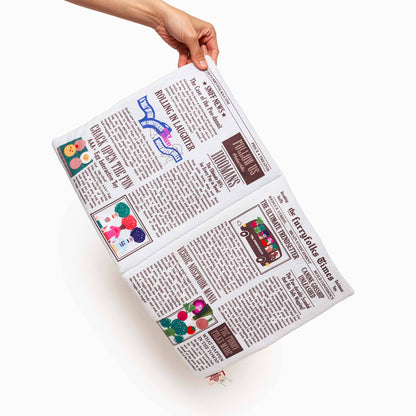 Juguete olfativo con forma de periódico